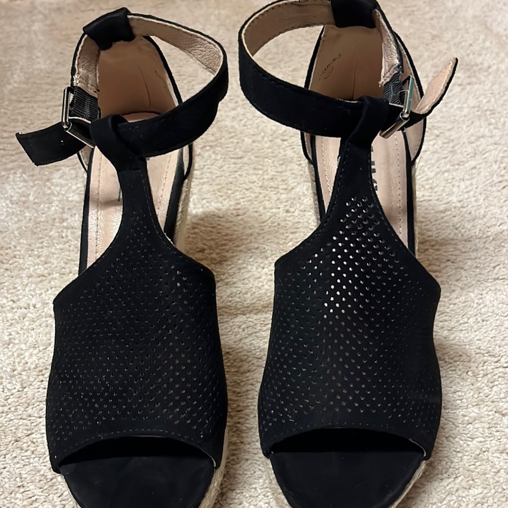 Cute open toe wedges. Worn once.